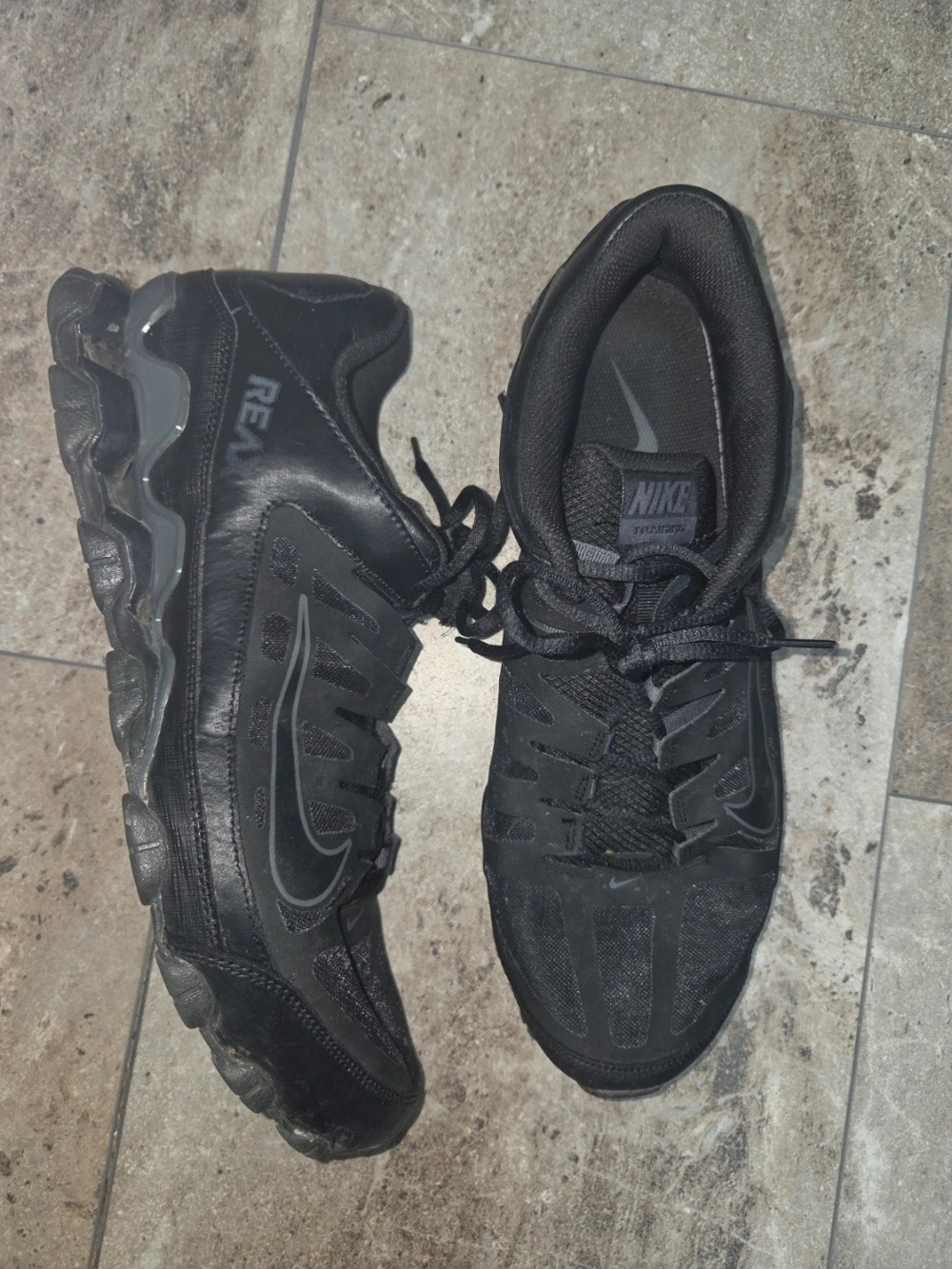 - Nike Men’s Black Athletic Running Sneakers